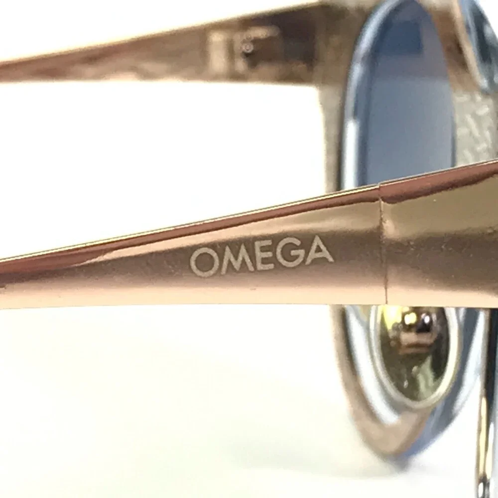 Omega Sunglasses OM 0023-H 92X Clear Blue Gold Cat Eye Frames with Blue Lenses